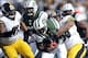 Oct 13, 2013; East Rutherford, NJ, USA; Pittsburgh Steelers outside linebacker LaMarr Woodley (56) sacks New York Jets quarterback Geno Smith (7) during the first half at MetLife Stadium. Mandatory Credit: Joe Camporeale-USA TODAY Sports
