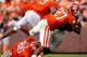 CLEMSON, SC - OCTOBER 12: Andre Williams #44 of the Boston College Eagles is tackled by Robert Smith #27 of the Clemson Tigers during the game at Memorial Stadium on October 12, 2013 in Clemson, South Carolina. (Photo by Tyler Smith/Getty Images)
