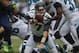 SEATTLE, WA - SEPTEMBER 22: Quarterback Chad Henne #7 of the Jacksonville Jaguars hands off to running back Maurice Jones-Drew #32 against the Seattle Seahawks at CenturyLink Field on September 22, 2013 in Seattle, Washington. (Photo by Otto Greule Jr/G