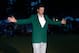 Apr 14, 2013; Augusta, GA, USA; Adam Scott waves to the crowd after receiving the green jacket after winning the 2013 The Masters golf tournament at Augusta National Golf Club. Mandatory Credit: Michael Madrid-USA TODAY Sports