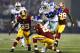 ARLINGTON, TX - OCTOBER 13: Jason Witten #82 of the Dallas Cowboys is tackled by Josh Wilson #26 of the Washington Redskins at AT&T Stadium on October 13, 2013 in Arlington, Texas. (Photo by Wesley Hitt/Getty Images)