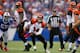 ORCHARD PARK, NY - OCTOBER 13: Andy Dalton #14 of the Cincinnati Bengals scrambles against the Buffalo Bills at Ralph Wilson Stadium on October 13, 2013 in Orchard Park, New York. Cincinnati won 27-24. (Photo by Rick Stewart/Getty Images)