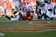 DENVER, CO - OCTOBER 13: Running back Knowshon Moreno #27 of the Denver Broncos looks towards the referee to confirm his third quarter touchdown after John Cyprien #37, Paul Posluszny #51 and cornerback Mike Harris #20 of the Jacksonville Jaguars were un