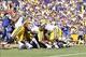 Freshman quarterback Anthony Jennings sneaks into the end zone for his first rushing touchdown of the season.