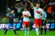 WARSAW, POLAND - OCTOBER 17: Wayne Rooney of England looks dejected as Poland celebrate their goal to make it 1-1 during the FIFA 2014 World Cup Qualifier between Poland and England at the National Stadium on October 17, 2012 in Warsaw, Poland. (Photo by