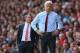 LIVERPOOL, ENGLAND - SEPTEMBER 02: Arsene Wenger the manager of Arsenal and Brendan Rodgers the manager of Liverpool look on during the Barclays Premier League match between Liverpool and Arsenal at Anfield on September 2, 2012 in Liverpool, England. (