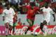 LISBON, PORTUGAL - JUNE 30: Deco of Portugal goes between Edgar Davids and Clarence Seedorf of Holland during the UEFA Euro 2004 Semi Final match between Portugal and Holland at the Jose Alvalade Stadium on June 30, 2004 in Lisbon, Portugal. (Photo by Sh
