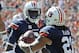 Oct 12, 2013; Auburn, AL, USA; Auburn Tigers quarterback Jeremy Johnson (6) and running back Tre Mason (21) celebrate a touchdown in the first half against the Western Carolina Catamounts at Jordan Hare Stadium. Mandatory Credit: Shanna Lockwood-USA TODAY