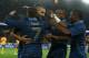 PARIS, FRANCE - OCTOBER 11: Karim Benzema of France is mobbed by team mates after scoring the sixth goal during the International Friendly match between France and Australia at Parc des Princes on October 11, 2013 in Paris, France. (Photo by David Roger