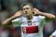 WARSAW, POLAND - SEPTEMBER 06: Poland's Robert Lewandowski celebrates after scoring during the FIFA 2014 World Cup Qualifier between Poland and Montenegro at the National Stadium on September 06, 2013 in Warsaw, Poland. (Photo by Adam Nurkiewicz/Getty I