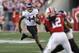 MADISON, WI - OCTOBER 12: Christian Jones #14 of the Northwestern Wildcats makes the catch and runs for more yards during the second half of play against the Wisconsin Badgers at Camp Randall Stadium on October 12, 2013 in Madison, Wisconsin. (Photo by Mi