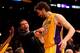 LOS ANGELES, CA - APRIL 17: Injured player Steve Nash #10 of the Los Angeles Lakers greets Pau Gasol #16 as he comes off the floor in the colsing seconds of the game against the Houston Rockets at Staples Center on April 17, 2013 in Los Angeles, Californ