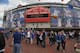 CHICAGO, IL - APRIL 08: General view of fans take pictures outside the main entrance to Wrigley Field before the Opening Day game between the Chicago Cubs and the Milwaukee Brewers on April 8, 2013 in Chicago, Illinois. (Photo by Jonathan Daniel/Getty I