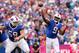 Oct 13, 2013; Orchard Park, NY, USA; Buffalo Bills quarterback Thad Lewis (9) passes as center Doug Legursky (59) blocks against the Cincinnati Bengals during the second half at Ralph Wilson Stadium. Bengals beat the Bills 27-24 in overtime. Mandatory Cre