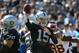 Sep 29, 2013; Oakland, CA, USA; Oakland Raiders quarterback Matt Flynn (15) passes the football against the Washington Redskins during the first quarter at O.co Coliseum. Mandatory Credit: Kyle Terada-USA TODAY Sports