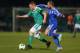 BELFAST, NORTHERN IRELAND - MARCH 26: Sammy Clingan of Northern Ireland holds off a challenge from Itay Shechter of Israel during the FIFA 2014 World Cup Group F Qualifier match between Northern Ireland and Israel at Windsor Park on March 26, 2013 in Bel