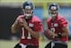 July 27, 2012; Jacksonville FL, USA; Jacksonville Jaguars quarterback Blaine Gabbert (11) and quarterback Chad Henne (7) during the first afternoon of training camp practice at Florida Blue Health & Wellness Practice Fields. Mandatory Credit: Phil Sears-