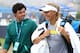 EASTBOURNE, ENGLAND - JUNE 20: Rory McIlroy and girlfriend Caroline Wozniacki leave the practice court during day six of the AEGON International tennis tournament at Devonshire Park on June 20, 2013 in Eastbourne, England. (Photo by Jan Kruger/Getty Ima