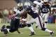 Oct 13, 2013; Foxborough, MA, USA; New England Patriots outside linebacker Jerod Mayo (right) tackles New Orleans Saints tight end Benjamin Watson (left) during the second half at Gillette Stadium. Mandatory Credit: Mark L. Baer-USA TODAY Sports