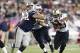 Oct 13, 2013; Foxborough, MA, USA; New Orleans Saints running back Pierre Thomas (right) runs the ball against New England Patriots defensive tackle Joe Vellano (left) during the second half at Gillette Stadium. Mandatory Credit: Mark L. Baer-USA TODAY Sp