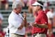 DALLAS, TX - OCTOBER 12: (L-R) Head coach Mack Brown of the Texas Longhorns talks with head coach Bob Stoops of the Oklahoma Sooners before the Longhorns take on the Sooners at Cotton Bowl on October 12, 2013 in Dallas, Texas. (Photo by Tom Pennington/Ge