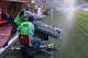 BRUSSELS, BELGIUM - AUGUST 14: A television crew and camera are soaked by the watering system prior to the International friendly match between Belgium and France at the King Baudouin Stadium on August 14, 2013 in Brussels, Belgium. (Photo by David Roge