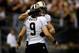 NEW ORLEANS, LA - SEPTEMBER 30: Jimmy Graham #80 celebrates with Drew Brees #9 of the New Orleans Saints after scoring a touchdown against the Miami Dolphins at the Mercedes-Benz Superdome on September 30, 2013 in New Orleans, Louisiana. (Photo by Chri