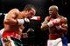 LAS VEGAS - SEPTEMBER 19: Juan Manuel Marquez (L) and Floyd Mayweather Jr. battle in the ninth round of their fight at the MGM Grand Garden Arena September 19, 2009 in Las Vegas, Nevada. Mayweather won by unanimous decision. (Photo by Ethan Miller/Getty