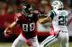 ATLANTA, GA - OCTOBER 07: Tight end Tony Gonzalez #88 of the Atlanta Falcons runs with the ball as strong safety Dawan Landry #26 of the New York Jets defends during their game at the Georgia Dome on October 7, 2013 in Atlanta, Georgia. (Photo by Kevin