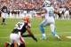 CLEVELAND, OH - OCTOBER 13: Tight end Joseph Fauria #80 of the Detroit Lions catches a touchdown pass in front of linebacker Craig Robertson #53 of the Cleveland Browns at FirstEnergy Stadium on October 13, 2013 in Cleveland, Ohio. (Photo by Matt Sulliv