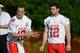 January 25, 2013; Ko Olina, HI, USA; AFC quarterback Peyton Manning of the Denver Broncos (18) prepares to take the snap as AFC quarterback Andrew Luck of the Indianapolis Colts (12) looks on during practice at AFC media day for the 2013 Pro Bowl at the J