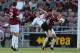 NORTHAMPTON, ENGLAND - AUGUST 06: Patrick Bamford of MK Dons challenges for the ball with Matt Heath of Northampton Town during the Capital One Cup First Round match between Northampton Town and MK Dons at Sixfields Stadium on August 6, 2013 in Northampt