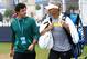 EASTBOURNE, ENGLAND - JUNE 20: Rory McIlroy and girlfriend Caroline Wozniacki leave the practice court during day six of the AEGON International tennis tournament at Devonshire Park on June 20, 2013 in Eastbourne, England. (Photo by Jan Kruger/Getty Ima