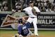 Sep 26, 2013; Bronx, NY, USA; New York Yankees second baseman Robinson Cano (24) completes a double play over Tampa Bay Rays second baseman Ben Zobrist (18) at Yankee Stadium. Mandatory Credit: William Perlman/THE STAR-LEDGER via USA TODAY Sports