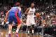 NEW YORK, NY - OCTOBER 12: Paul Pierce #34 of the Brooklyn Nets controls the ball against Jonas Jerebko #33 of the Detroit Pistons during a preseason game at the Barclays Center on October 12, 2013 in the Brooklyn borough of New York City. NOTE TO USER: