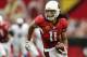 GLENDALE, AZ - SEPTEMBER 15: Wide receiver Larry Fitzgerald #11 of the Arizona Cardinals runs with the football after a reception against the Detroit Lions during the NFL game at the University of Phoenix Stadium on September 15, 2013 in Glendale, Arizon