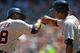 CHICAGO, IL - JULY 25: Torii Hunter #48 of the Detroit Tigers (L) is congratulated by Austin Jackson #14 after hitting a two-run home run in the 4th inning against the Chicago White Sox at U.S. Cellular Field on July 25, 2013 in Chicago, Illinois. (Phot