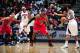 ATLANTA, GA - FEBRUARY 20: LeBron James #6 of the Miami Heat defends against Jeff Teague #0 of the Atlanta Hawks on February 20, 2013 at Philips Arena in Atlanta, Georgia. NOTE TO USER: User expressly acknowledges and agrees that, by downloading and/or u