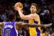 LAS VEGAS, NV - OCTOBER 10: Pau Gasol #16 of the Los Angeles Lakers looks to pass as Patrick Patterson #9 of the Sacramento Kings defends during their preseason game at the MGM Grand Garden Arena on October 10, 2013 in Las Vegas, Nevada. Sacramento won 1