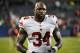 Oct 10, 2013; Chicago, IL, USA; New York Giants running back Brandon Jacobs (34) leaves the field after the game against the Chicago Bears at Soldier Field. The Bears beat the Giants 27-21. Mandatory Credit: Rob Grabowski-USA TODAY Sports