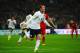 LONDON, ENGLAND - OCTOBER 15: Wayne Rooney of England celebrates after scoring his team's opening goal during the FIFA 2014 World Cup Qualifying Group H match between England and Poland at Wembley Stadium on October 15, 2013 in London, England. (Photo b