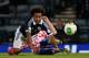 GLASGOW, SCOTLAND - OCTOBER 15: Ikechi Anya of Scotland is tackled by Domagoj Vida of Croatia during the FIFA 2014 World Cup Qualifying Group A match between Scotland and Croatia at Hampden Park on October 15, 2013 in Glasgow, Scotland. (Photo by Clive