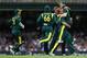 SYDNEY, AUSTRALIA - FEBRUARY 26: David Warner and Brett Lee of Australia celebrate after Warner ran out Sachin Tendulkar of India during the One Day International match between Australia and India at Sydney Cricket Ground on February 26, 2012 in Sydney,