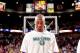 PORTLAND, OR - APRIL 10: Kobe Bryant #24 of the Los Angeles Lakers, wearing an NBA Green Week T-shirt, listens to the National Anthem before playing against the Portland Trail Blazers on April 10, 2013 at the Rose Garden Arena in Portland, Oregon. NOTE TO
