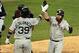 Oct 15, 2013; Detroit, MI, USA; Boston Red Sox first baseman Mike Napoli (right) celebrates hitting a home run with catcher Jarrod Saltalamacchia (39) against the Detroit Tigers during the seventh inning in game three of the American League Championship