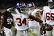 Oct 10, 2013; Chicago, IL, USA; New York Giants running back Brandon Jacobs (34) reacts after scoring a touchdown during the first half at Soldier Field. Mandatory Credit: Mike DiNovo-USA TODAY Sports