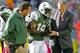 EAST RUTHERFORD, NJ - OCTOBER 13: Wide receiver Clyde Gates #19 of the New York Jets is walked off the field by team medical personal after getting injured on a play during the second half against the Pittsburgh Steelers at MetLife Stadium on October 13,