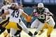 EAST RUTHERFORD, NJ - OCTOBER 13: Running back Chris Ivory #23 of the New York Jets looks for an opening as linebacker Jason Worilds #93 and safety Troy Polamalu #43 of the Pittsburgh Steelers close in during the third quarter during a game at MetLife Sta