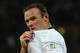 LONDON, ENGLAND - OCTOBER 15: Wayne Rooney of England celebrates after scoring his team's opening goal during the FIFA 2014 World Cup Qualifying Group H match between England and Poland at Wembley Stadium on October 15, 2013 in London, England. (Photo b