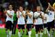 LONDON, ENGLAND - OCTOBER 15: England players celebrate as they qualify for the World Cup in Brazil after the FIFA 2014 World Cup Qualifying Group H match between England and Poland at Wembley Stadium on October 15, 2013 in London, England. (Photo by Mi